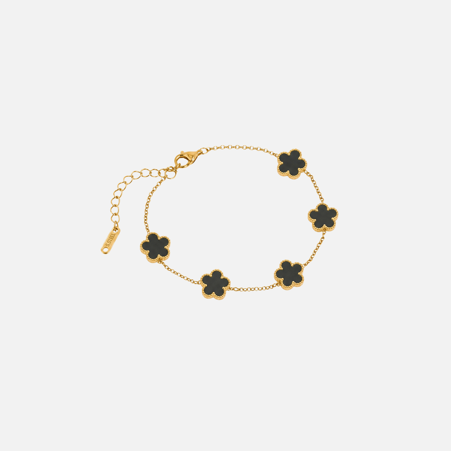 Trèfle Bracelet Gold & Onyx by Vaurie Paris, gold tone chain bracelet with black five-leaf clover charms