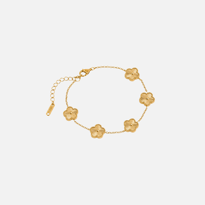 Trèfle Bracelet Gold by Vaurie Paris, gold tone chain bracelet with five-leaf clover charms on white background